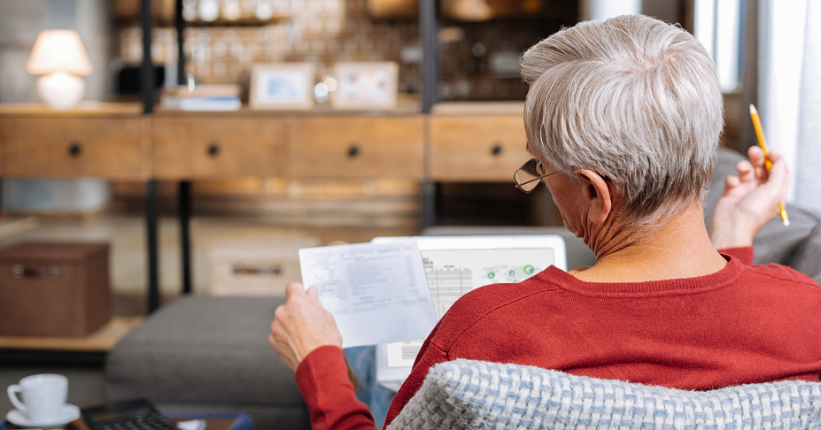 elderly person checking social security increase information